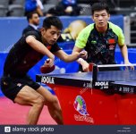 doha-qatar-26th-mar-2016-fan-zhendong-and-zhang-jike-l-of-china-compete-FT9JWA.jpg