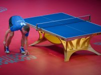 Patric Franzisca Picks up Ball.jpg