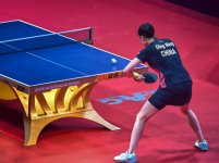 Ding Ning Preparing a Backhand Topspin.jpg