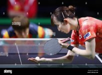 japans-hina-hayata-front-competes-against-chinas-wang-yidi-in-a-womens-singles-quarterfinal-ma...jpg